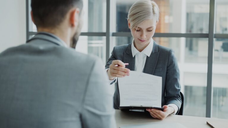 interviewer reading CV