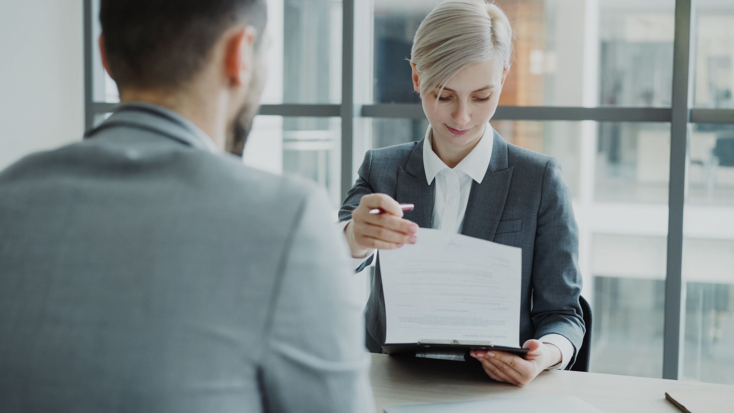 interviewer reading CV
