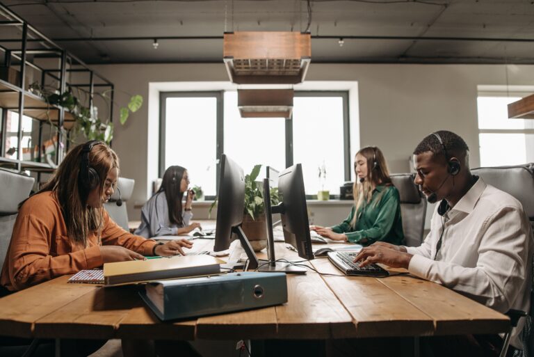people working on desks